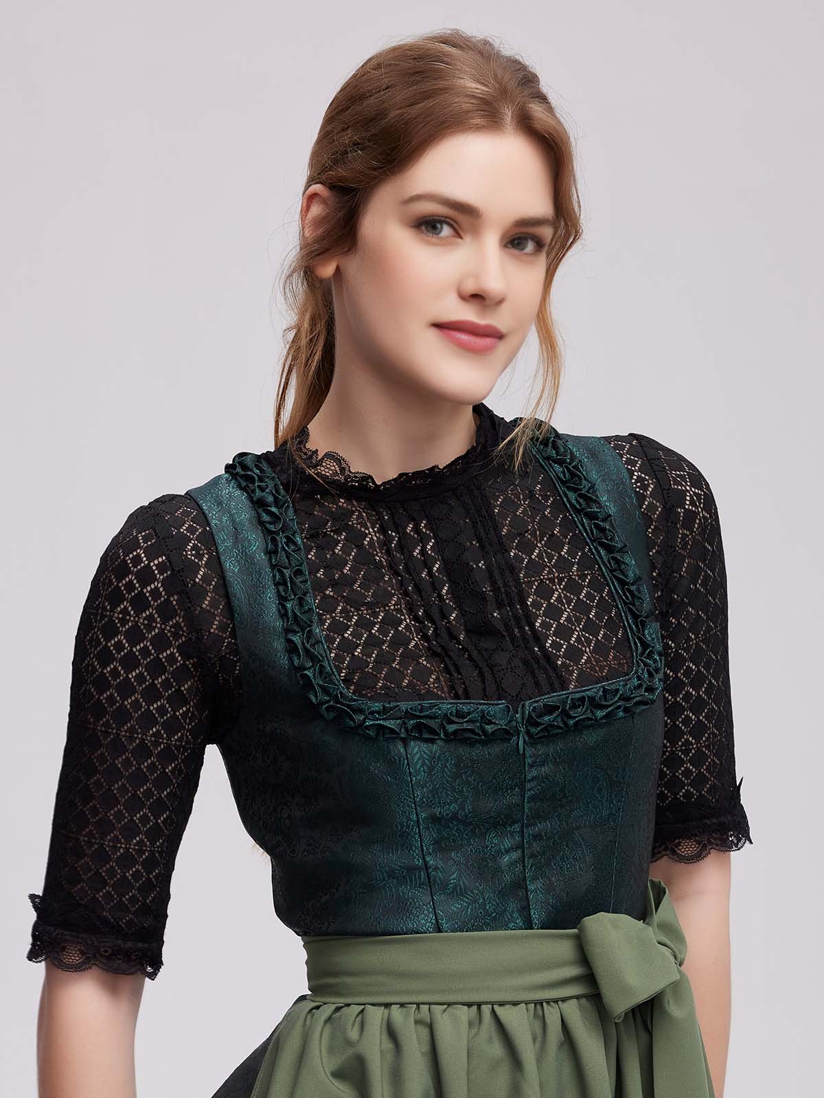 Graues Dirndl mit floraler Schürze